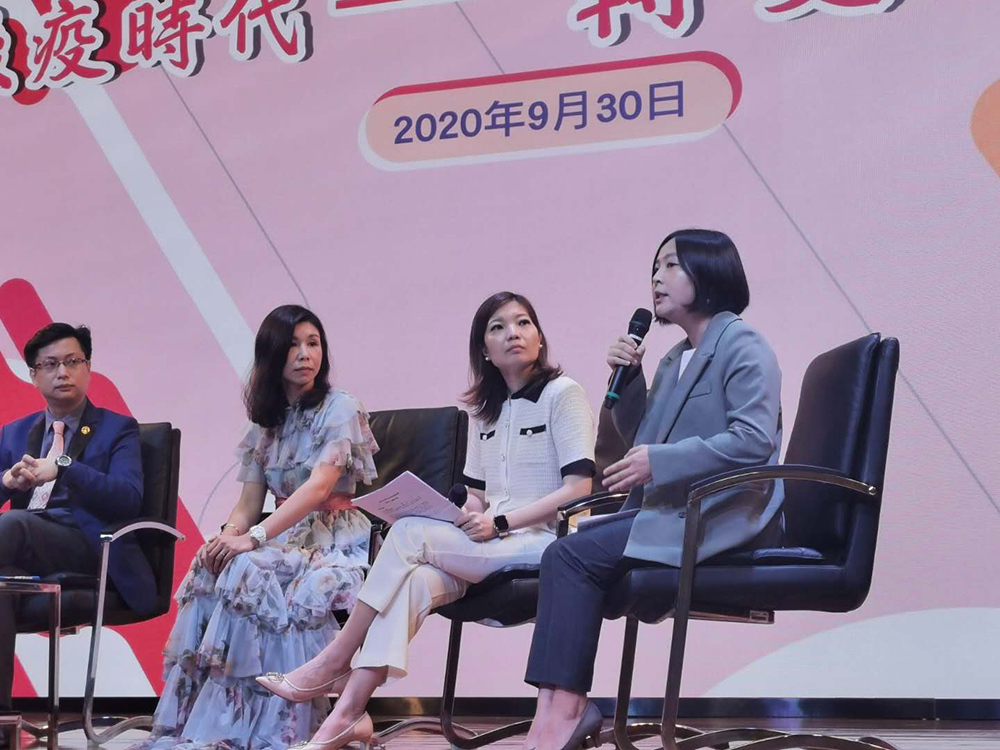 Tiffany Chui (right) shares her experience with the local community