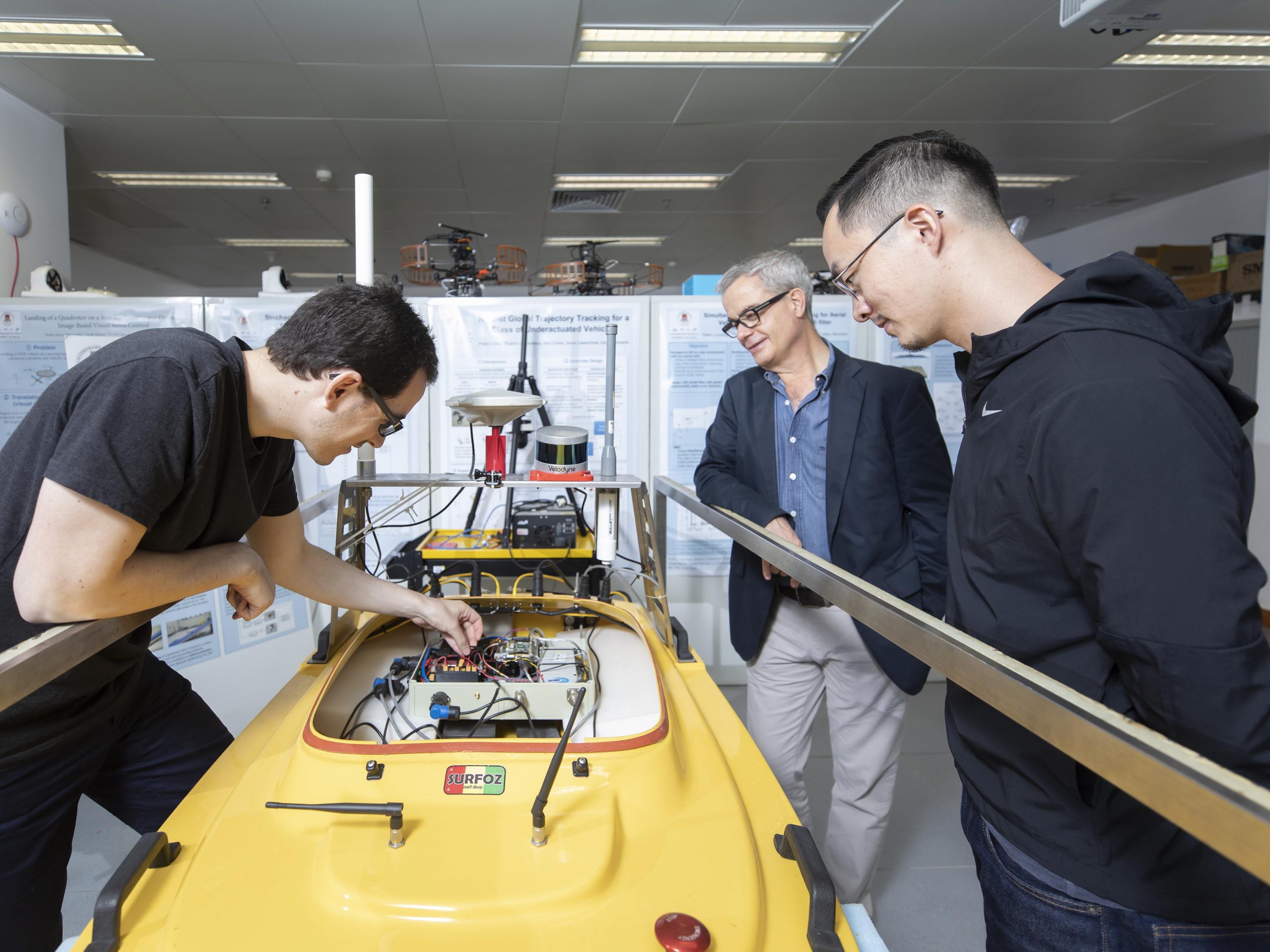 Prof Carlos Silvestre (middle), research assistant Dr Joel Reis (left), and PhD student Yu Gan